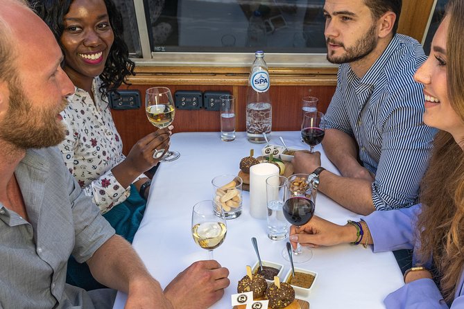 Amsterdam: Wine and Cheese Evening Cruise - Wine, cheese, and the onboard tasting rhythm