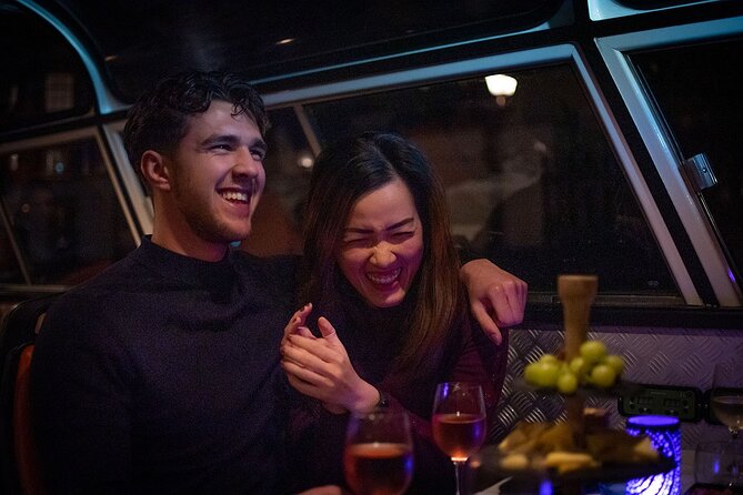 Amsterdam Wine and Cheese Guided Evening Cruise - The Canal Belt in Nightlight: Golden Bend, Gracht Names, and Big Views