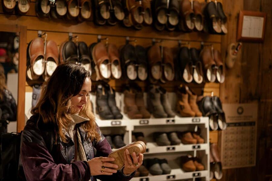 Amsterdam: Zaanse Schans windmills & Volendam Guided Tour - Clogs at a wooden shoe factory: watching craft, not just buying souvenirs