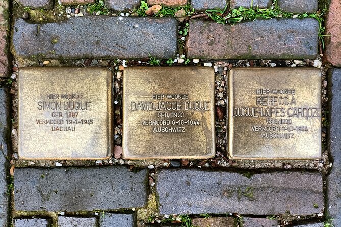 Anne Frank and Amsterdam Jewish History Walking Tour - Dam Square: WWII Memorials Set the Tone