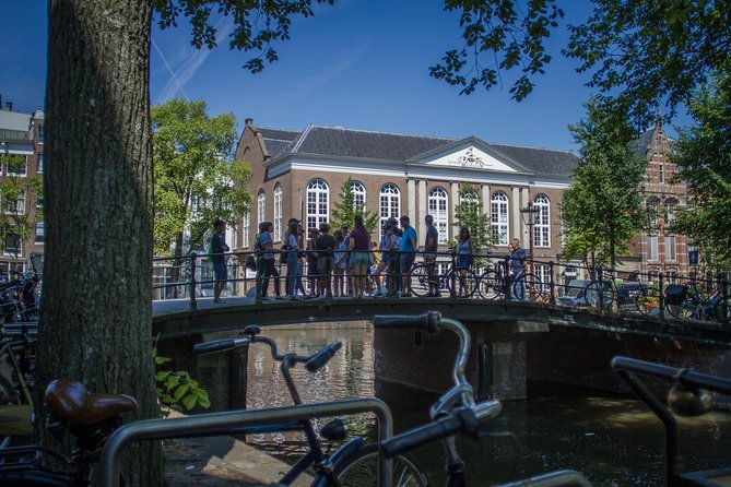 Anne Frank Private Bike Tour in Amsterdam - Where you meet: the Staalmeester Bridge and the orange umbrella trick