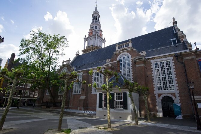 Anne Frank Small Group Walking Tour - Finishing near the Anne Frank House: statue and next steps