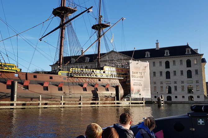 Classic Salonboat Tour in Amsterdam Including Cheese and Wine - Boarding at Westermarkt 20, settling in, and why the boat setup matters
