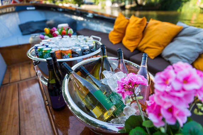 Classic Salonboat Tour in Amsterdam Including Cheese and Wine - Magere Brug and the Skinny Bridge photo moment that anchors the route