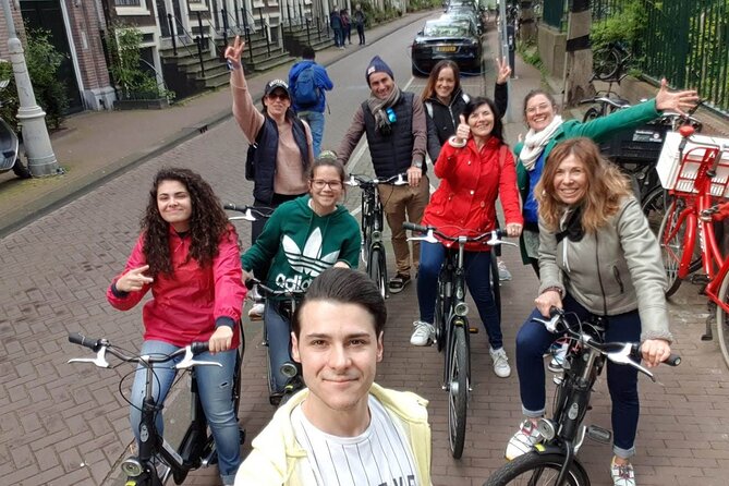Daily group bike tour in Spanish. - Herengracht along the Grand Canals: the why behind the view