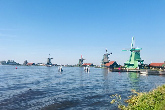 Day Tour Giethoorn, Afsluitdijk and Zaanse Schans with Boat Cruise - Getting From Amsterdam: Pickup Window, Small Group Size, and Timing