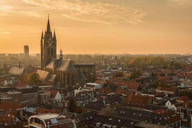 Delft: City Walk with Audio Guide in 7 Languages on your Phone - Delft City Hall on Markt, rebuilt after fires, and why that matters