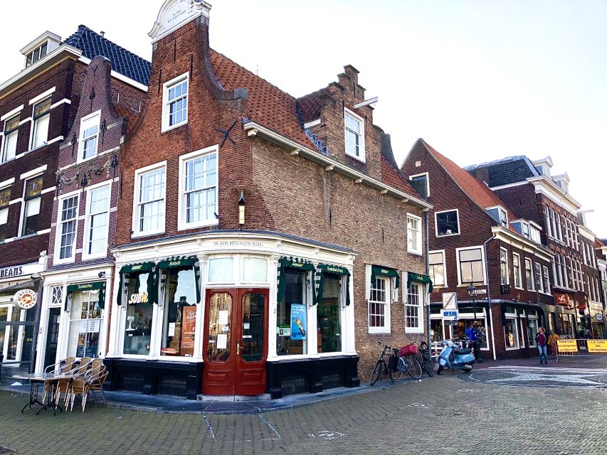 Delft: Private Historical and Cultural Guided Walking Tour - Canals, bridges, and the quiet courtyard maze of Delft