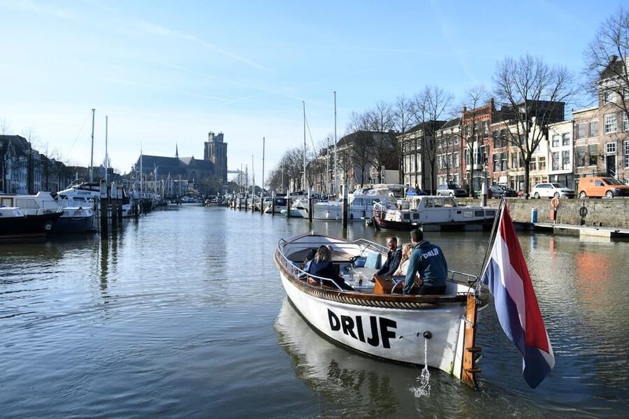 Dordrecht: City Canal Cruise - Open Sloops, Rain Cover, and Onboard Comfort