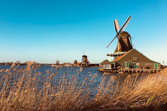 Dreamy Dutch Villages Tour: Giethoorn, Zaanse Schans & More - Zaanse Schans windmills, green houses, and the polders story