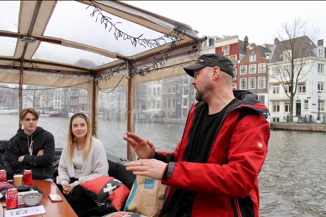 Dutch Cheese & Drinks Guided Amsterdam Boat Tour, All Inclusive - Oudezijds Voorburgwal to the 14th-century narrow canal start