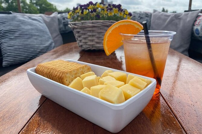 Dutch Cheese & Drinks Guided Amsterdam Boat Tour, All Inclusive - Cuypers station and Renzo Piano rooftop, Amsterdam with a working edge