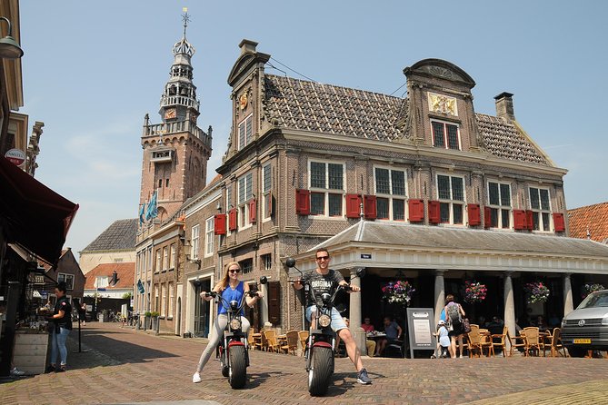 E-scooter rental Volendam - Countryside of Amsterdam - Monnickendam: bronze-brick streets and an easy harbour break