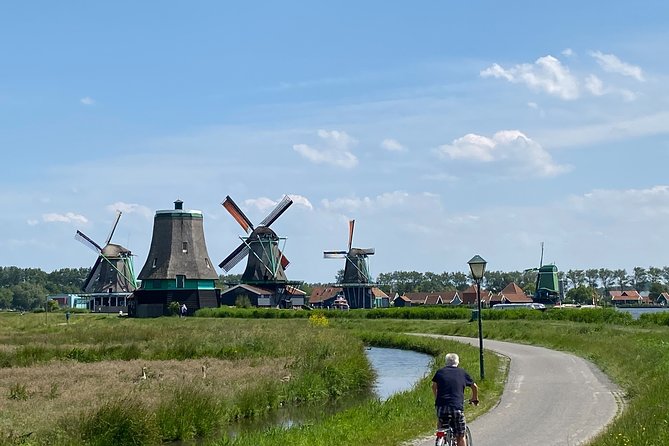 Escape Amsterdam: E-Bike to Zaanse Schans Windmills & Zaandam - NDSM Wharf: shipping past, street art present, then back toward Amsterdam