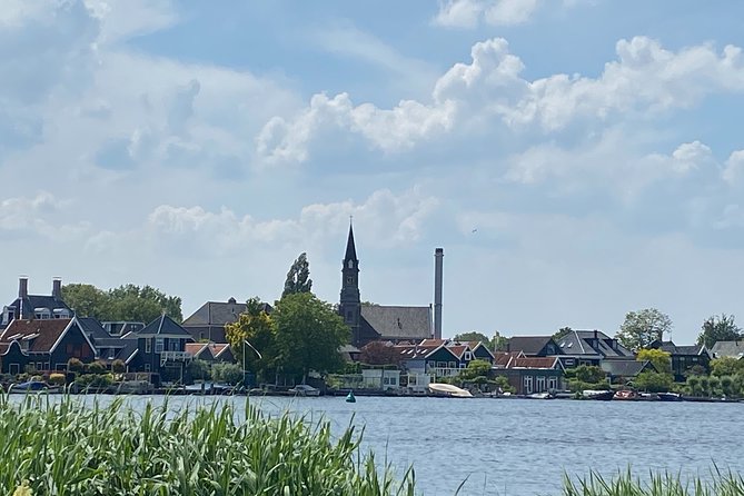 Escape Amsterdam: E-Bike to Zaanse Schans Windmills & Zaandam - Guide matters: names you might meet and the tone they set