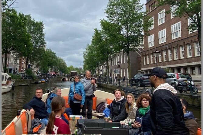 Explore Amsterdam by Bike in the Company of a French Local Guide - Negen Straatjes to Rijksmuseum to Museumplein: your walk-off plan starts here