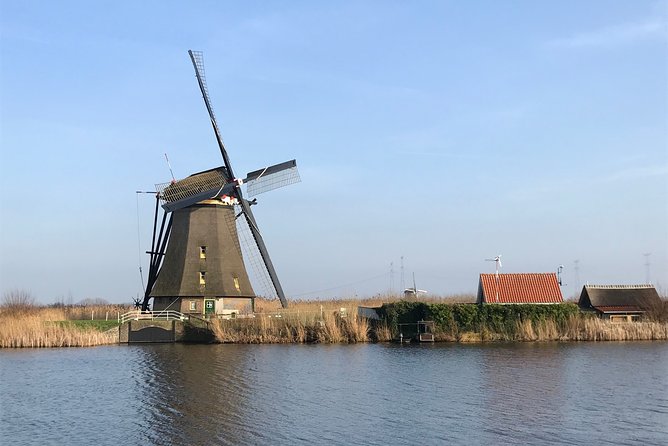 Famous Holland Tour: visit The Hague, Delft, Rotterdam and Kinderdijk from A'dam - Kinderdijk UNESCO windmills: 19 windmills and a 2-hour reality check
