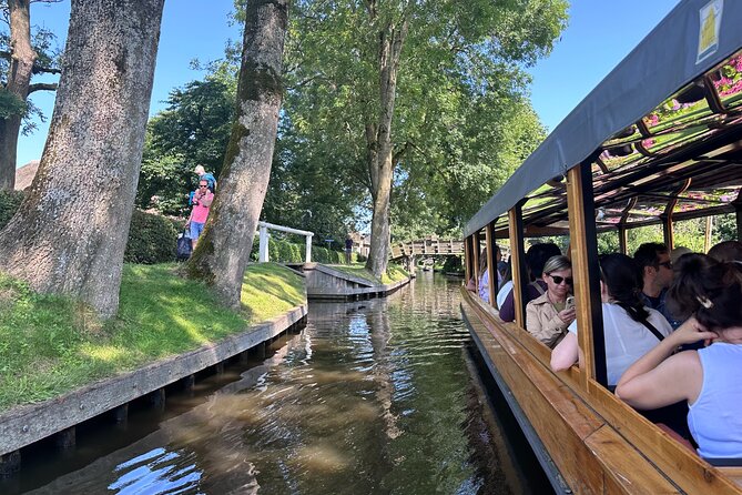 From Amsterdam: Giethoorn Day Trip with Canal & Village Tour - The included canal boat cruise: your best photo and your best understanding