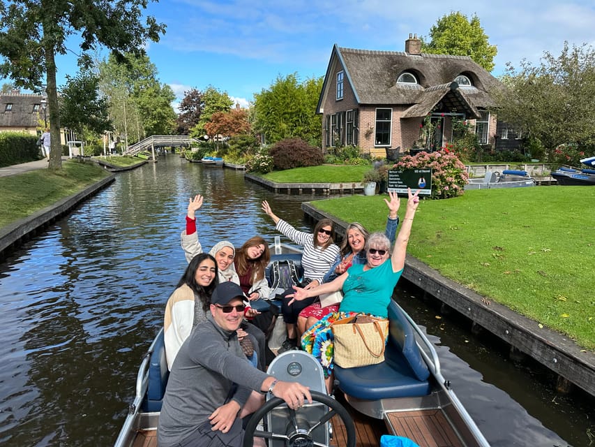 From Amsterdam: Giethoorn Small Group Tour with Boat Ride - Giethoorn on Foot: Bridges, Thatched Roofs, and Unhurried Village Time