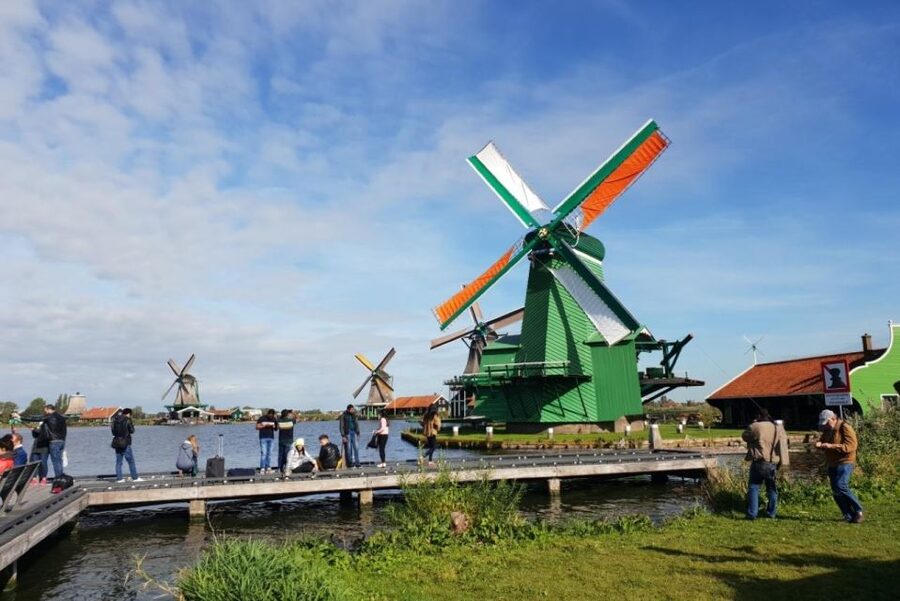 From Amsterdam: Giethoorn & Zaanse Schans Tour w/ Small Boat - Giethoorn canal village: photo time, footpaths, and a real electric-boat moment