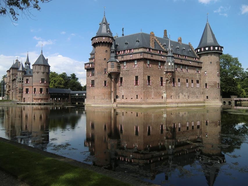 From Amsterdam: Muiderslot and De Haar Castle Tour - Muiderslot Castle: medieval rooms, paintings, and a fairy tale setting