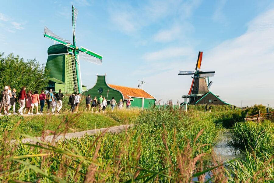 From Amsterdam: Zaanse Schans, Edam, & Marken Full-Day Trip - Marken Village Guided Walk: Wooden Houses, Harbor Views, and Weather Rules