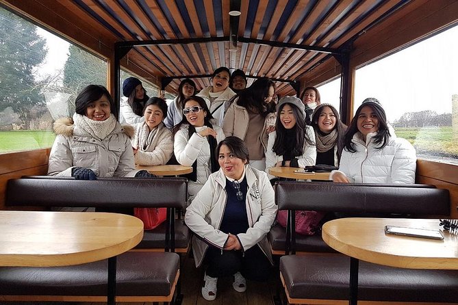 From Amsterdam: Zaanse Schans, Volendam, Giethoorn with Boat Tour - Volendam Haven: Wooden Houses, Harbor Photos, and Traditional Dress