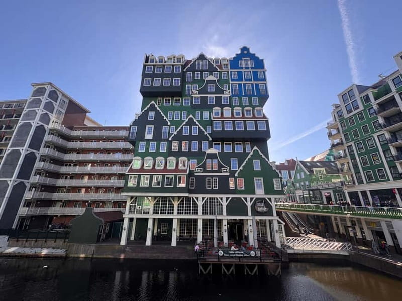 From Amsterdam: Zaanse Schans Windmills & More - E-Bike Tour - The Morning Ride Out of Amsterdam: Ferry, Bike Lanes, and Waterlands Views