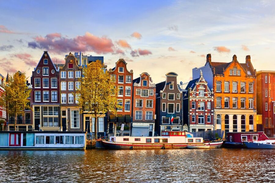 From Brussels: Day Trip to Amsterdam with Canal Boat Cruise - Guided Highlights in Amsterdam: Dam Square, Old Streets, and 13th-Century Threads