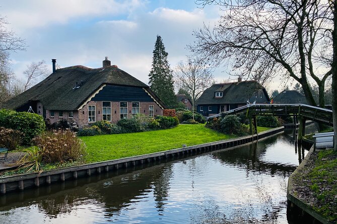 Giethoorn and Zaanse Schans Day Tour Small Group Incl. Boat Ride - Wooden shoes at Kooijman: watching, learning, and trying