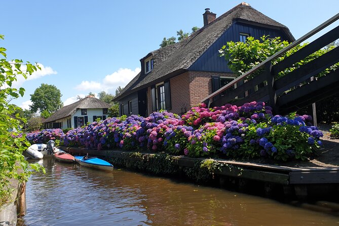 Giethoorn Day Tour from Amsterdam with Small Boat Ride - When Zaanse Schans shows up, treat it as bonus time, not a must