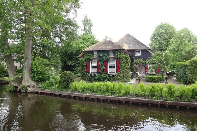 Giethoorn Day Tour from Amsterdam with Small Boat Ride - Price and value: $154.86 for transport plus the boat experience
