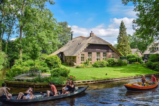 Giethoorn Day Trip from Amsterdam With Cruise and Cheeseplatter - Leaving Amsterdam Behind Without Losing Your Day