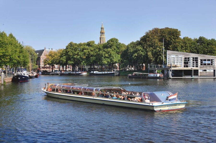 Groningen: City Canal Cruise - What You See First: Bridges, Medieval Houses, and Tower Silhouettes