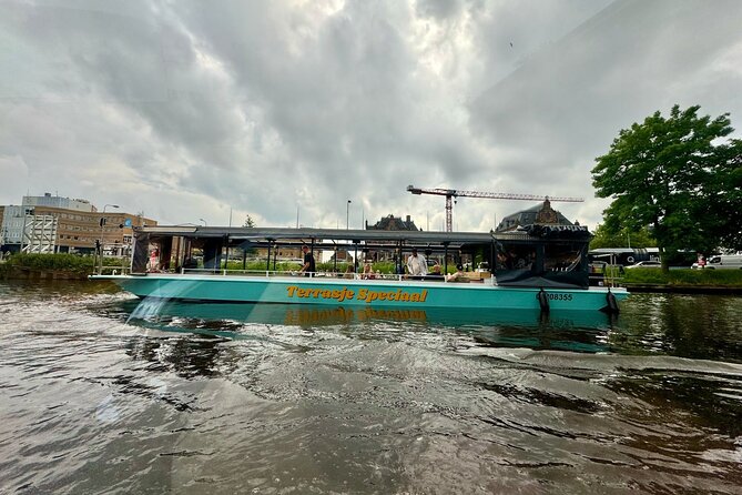 Groningen: Terrace Boat Experience with a Cozy Bar: 1 hour - The route you’ll actually see: Oosterhaven, Hoofdstation, and the statues-and-architecture stretch