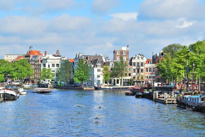 Guided Amsterdam Canal Cruise – Snacks & Drinks on board(1 Hour) - Key highlights worth clocking before you go
