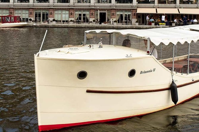 Guided Amsterdam Canal Cruise – Snacks & Drinks on board(1 Hour) - Oldest Amsterdam streets and the 1306 church, right in the middle of it all