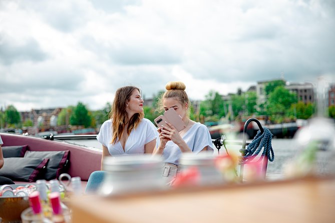 Guided Amsterdam Canal Cruise – Snacks & Drinks on board(1 Hour) - Old city wall remnants and medieval protection you can spot from the canal
