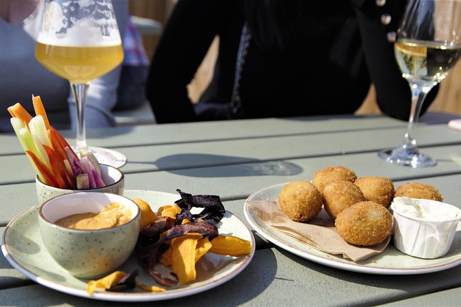 Guided Food Tour Haarlem (4-8 guests) - Old City - Grote Markt to six tasting stops: cheese, herring, beer, fries, and chocolate
