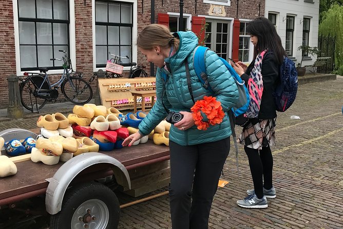 Half-Day Edam and Volendam Private Walking Tour from Amsterdam - Edam City Center: canals, wooden houses, and stories on the move