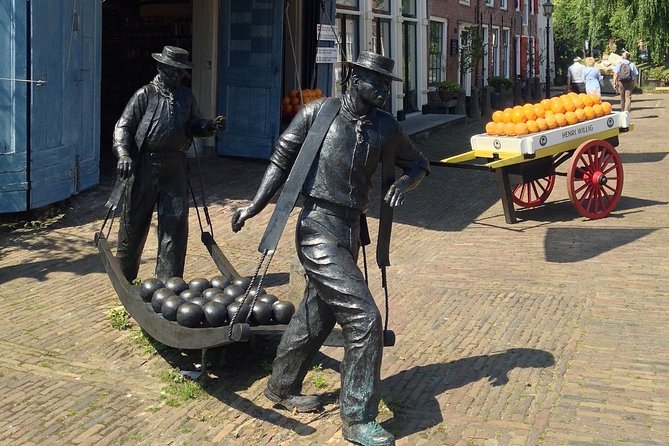 Half-Day Edam and Volendam Private Walking Tour from Amsterdam - Volendam City Center: promenade views, herring-and-cheese time, and fishing-town texture