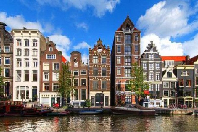 Half-Day Tour of Red Light District and Jordaan District with Private Guide in Amsterdam - Begijnhof and the Old Jewish Quarter Area: Quiet Corners Between Big Stories