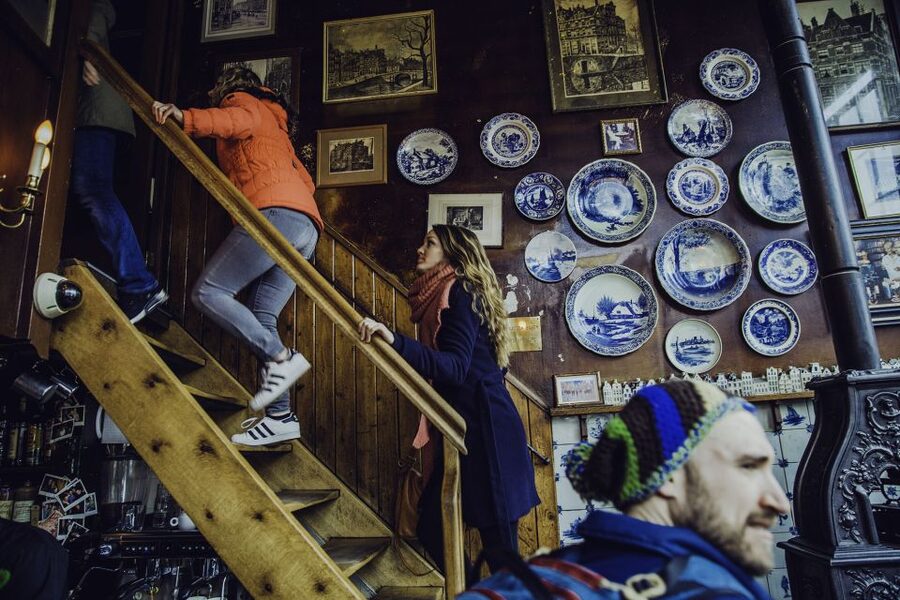 Humans of Amsterdam - Small group cultural walking tour - Canal Belt, De Jordaan, Dancing Houses, and the Red Light District