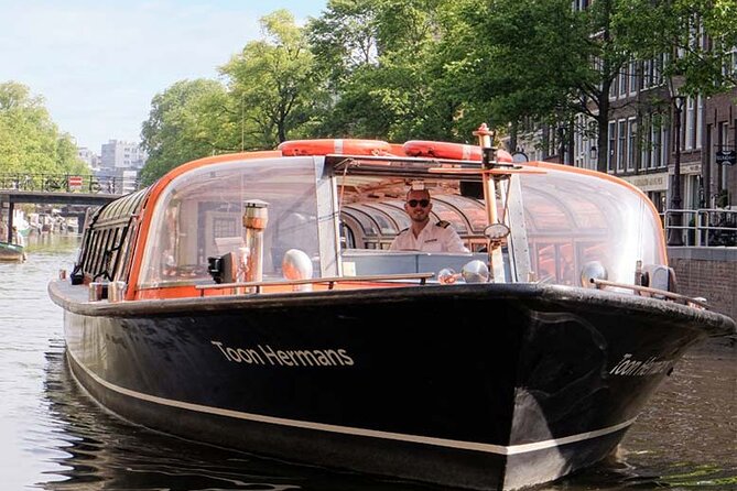 Keukenhof, Flower Fields, Volendam and Zaanse Schans Small-Group Tour - Volendam seaside time and Dutch costume photos
