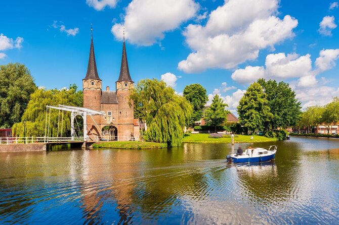 Kinderdijk Windmills and Delft Small-Group Tour from Amsterdam - Delft in a Half Day: Canals, Churches, Marketplace, and Pottery Energy