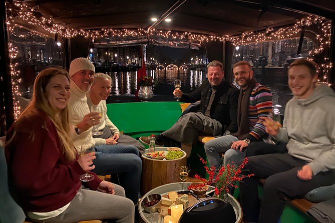 Light Event Amsterdam by small boat, 8 passengers max! You won't find any better - What you will see, light sculptures and the city’s night glow