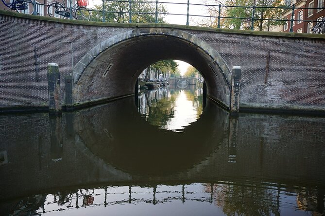 Morning Canal Cruise Amsterdam in Small-Group - Your 90 Minutes on the Canals: Houses, Bridges, and Reflections