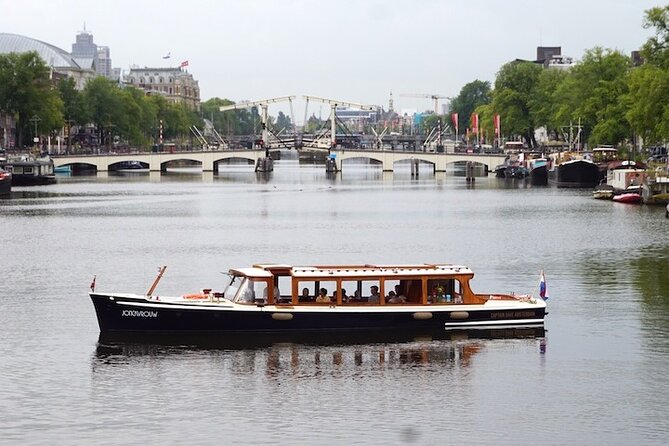 Morning Canal Cruise Amsterdam in Small-Group - The 1928 Saloon Boat Comfort: Warm, Dry, and Designed for Real Weather