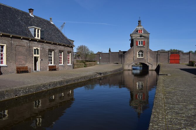 Photographic Tour in Delft Historical Center - Oostpoort: river and canal views that reward patience
