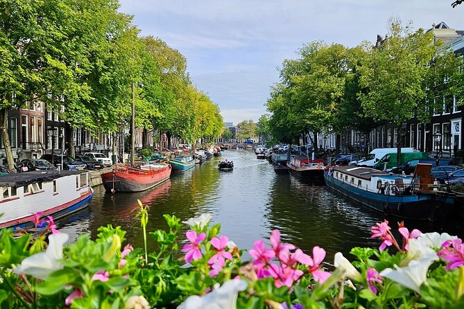 Private 90 Minute Amsterdam Canal Belt Exploration Cruise - From the Amstel River to dancing houses, the cruise starts with personality